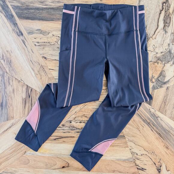 Athleta Pants - Athleta Ultimate Stash Pocket Ignite 7/8 Tight Legging, Black & Pink, Medium